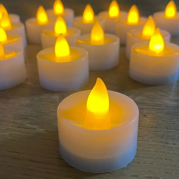 נרות לד אור צהוב על סוללות 24 יחידות נרות לד אור צהוב על סוללות 24 יחידות